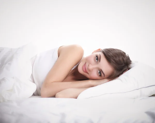 Beautiful girl lying in bedroom at early morning — Stock Photo, Image