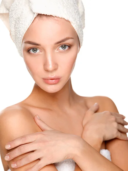 Beautiful woman with a towel on his head — Stock Photo, Image