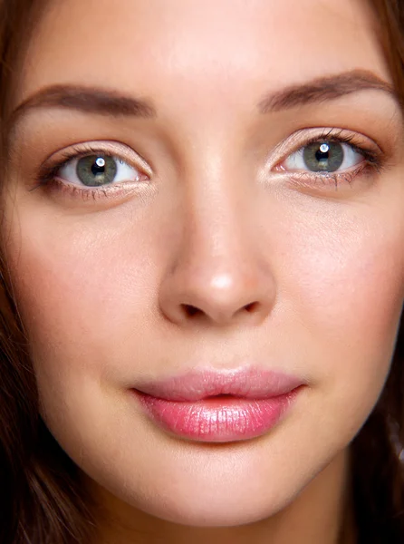 Close up portrait of beautiful young woman face. — Stock Photo, Image