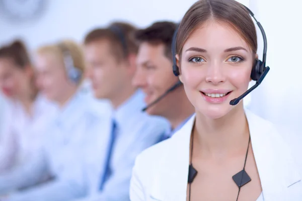 Attractive positive young businesspeople and colleagues in a call center office — Stock Photo, Image