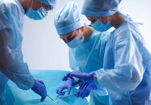 Team surgeon at work in operating room. — Stock Photo, Image