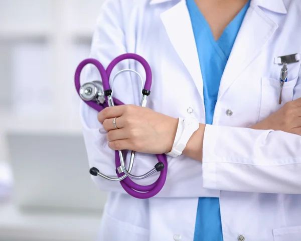 Medical team sitting at the table in modern hospital — Stock Photo, Image