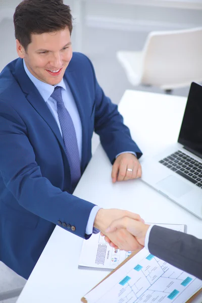 Business people shaking hands, finishing up a meeting, in office — Stock Photo, Image