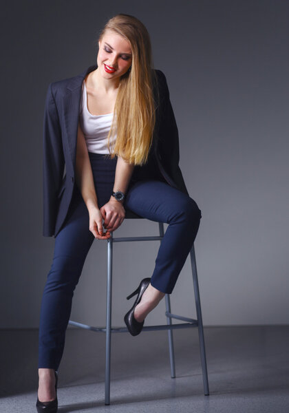 Young woman sitting on a chair