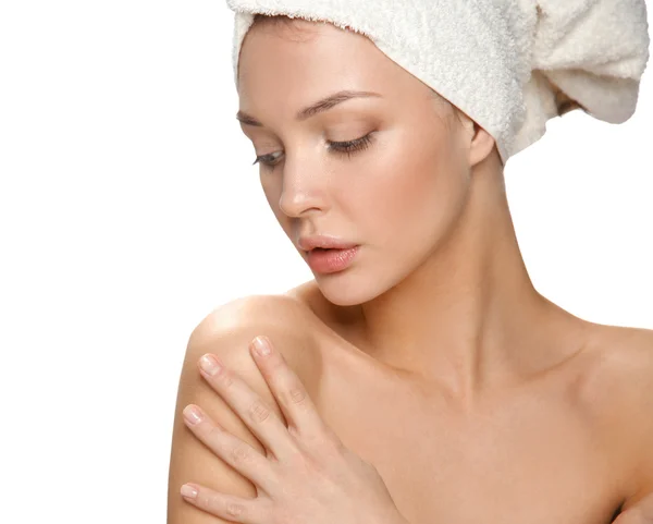 Beautiful woman with a towel on his head — Stock Photo, Image