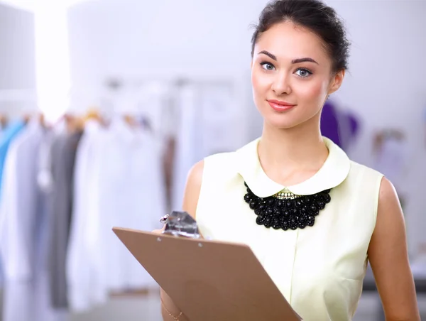 Modern young fashion designer working at studio. — Stock Photo, Image