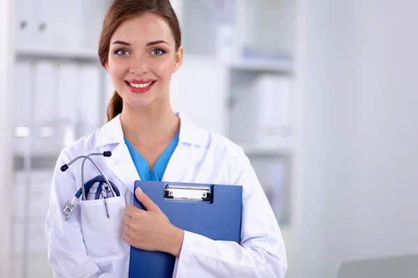 Medical team sitting at the table in modern hospital — Stock Photo, Image