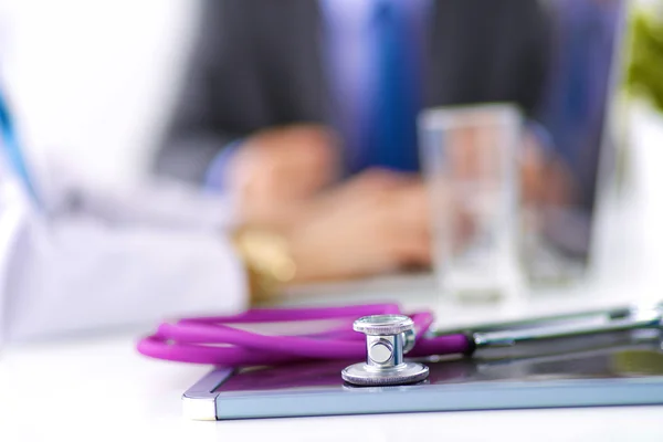 Medical team sitting at the table in modern hospital — Stock Photo, Image