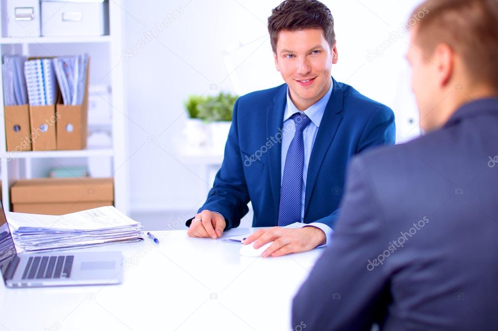 Business people working with laptop in an office