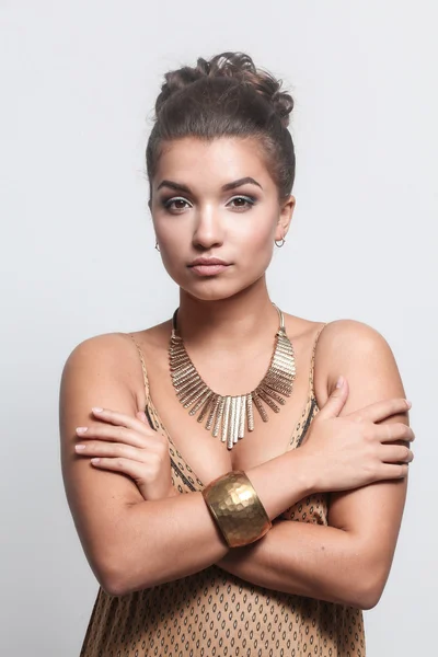 Young beautiful brunette woman with beads — Stock Photo, Image