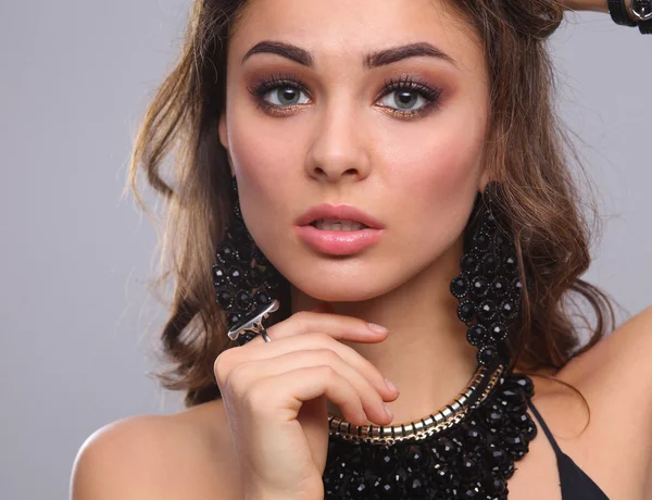 Portrait of a beautiful woman with necklace — Stock Photo, Image