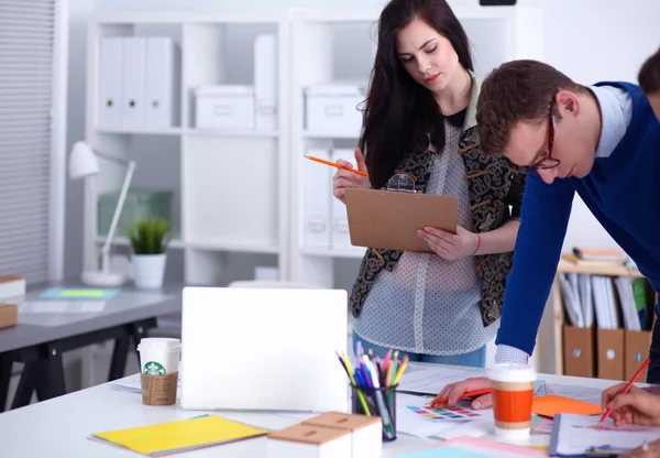 Young business people working at office on new project — Stock Photo, Image