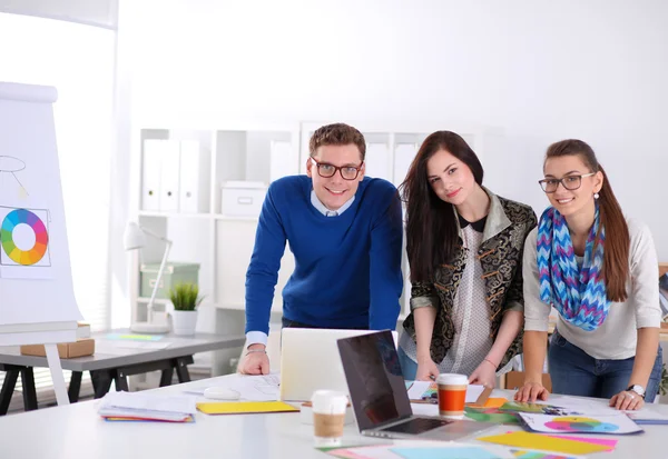 Young business people working at office on new project — Stock Photo, Image