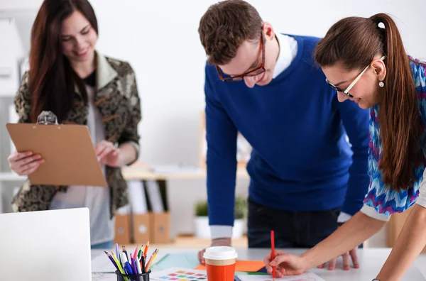 Young business people working at office on new project — Stock Photo, Image