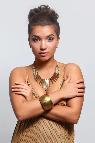 Young beautiful brunette woman with beads — Stock Photo, Image