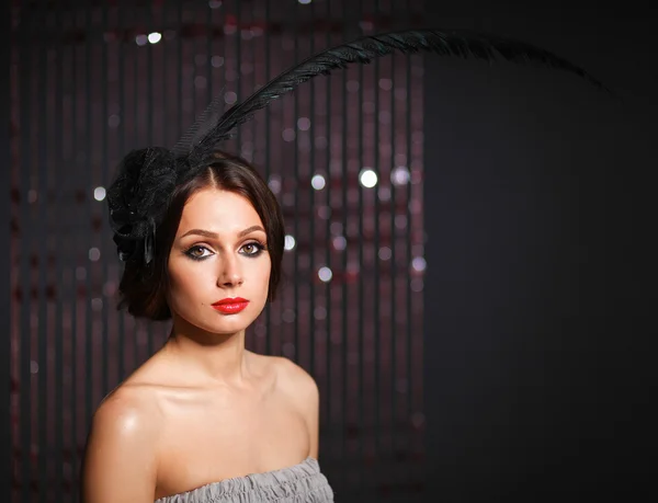 Portrait of beautiful young woman face. Isolated on dark background — Stock Photo, Image