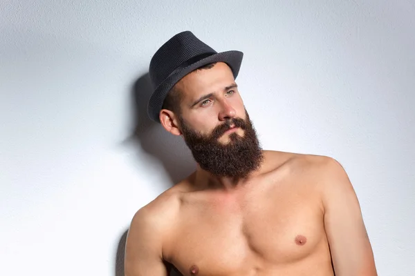 Portrait of handsome bearded man standing, isolated on grey background — Stock Photo, Image