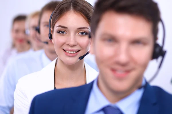 Attractive Smiling positive young businesspeople and colleagues in a call center office — Stock Photo, Image