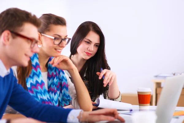 Young business people working at office on new project — Stock Photo, Image