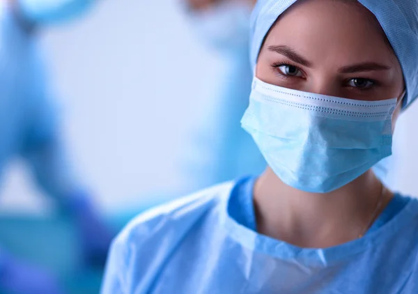 Teamchirurg aan het werk in de operatiekamer. — Stockfoto