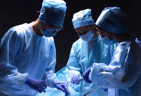 Team surgeon at work in operating room. — Stock Photo, Image