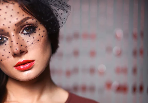 Portrait of beautiful young woman face. Isolated on dark background — Stock Photo, Image