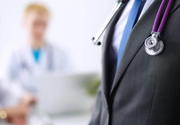 Portrait of a  male doctor standing in the hospital — Stock Photo, Image