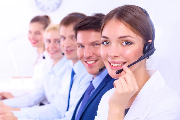 Attractive Smiling positive young businesspeople and colleagues in a call center office — Stock Photo, Image