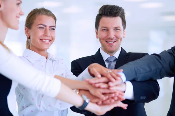 Business people with their hands together in a circle — Stock Photo, Image