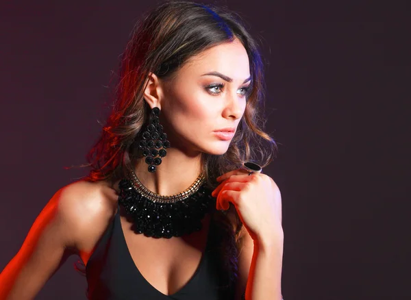 Portrait of a beautiful woman with necklace — Stock Photo, Image