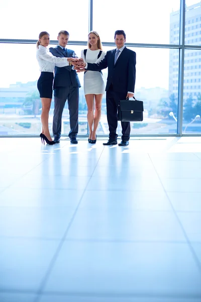 Business people with their hands together in a circle — Stock Photo, Image