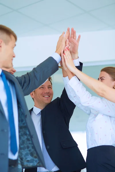 Business people with their hands together in a circle — Stock Photo, Image