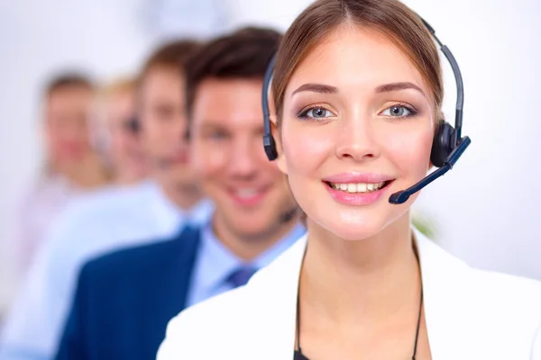 Attractive Smiling positive young businesspeople and colleagues in a call center office — Stock Photo, Image