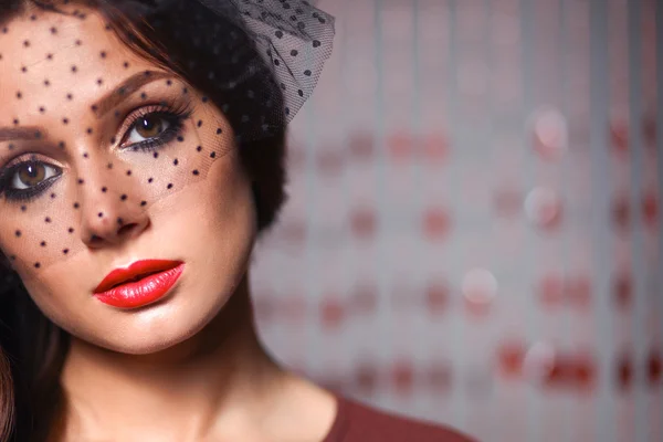 Portrait of beautiful young woman face. Isolated on dark background — Stock Photo, Image