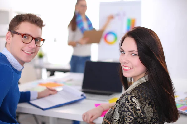 Young business people working at office on new project — Stock Photo, Image