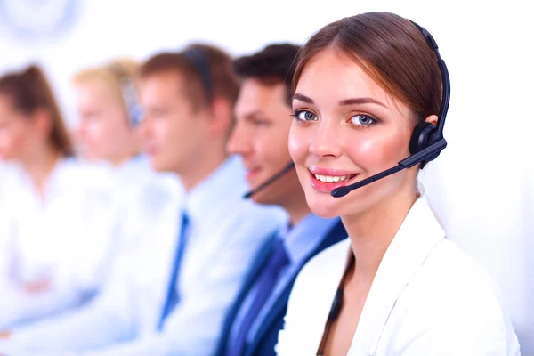 Attractive Smiling positive young businesspeople and colleagues in a call center office — Stock Photo, Image