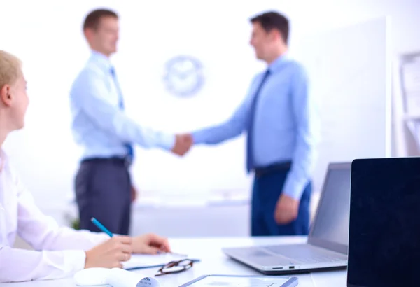 Business people shaking hands, finishing up a meeting, in office — Stock Photo, Image