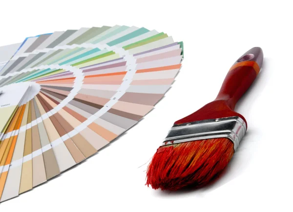 Close-up of a color palette and a brush ,isolated on white background. — Stock Photo, Image