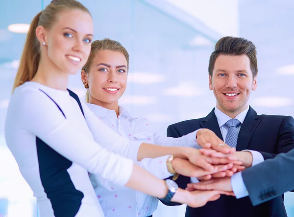 Business people with their hands together in a circle — Stock Photo, Image