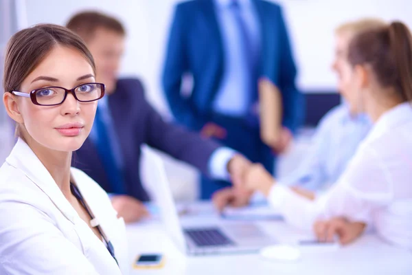 Business people shaking hands, finishing up a meeting, in office — Stock Photo, Image