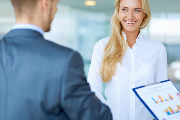 Two successful business people shaking hands with each other — Stock Photo, Image