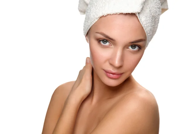 Beautiful woman with a towel on his head — Stock Photo, Image