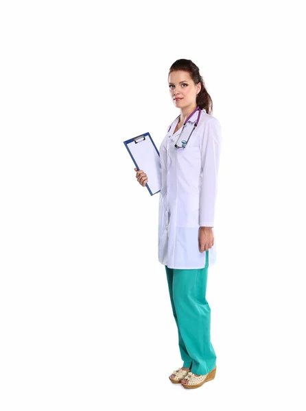 Portrait of young woman doctor with white coat standing in hospital — Stock Photo, Image