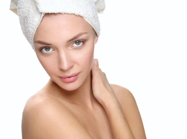 Beautiful woman with a towel on his head — Stock Photo, Image