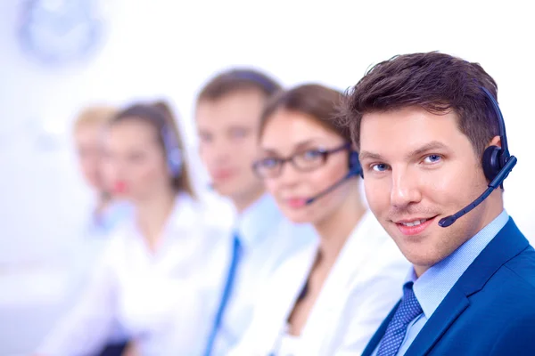 Attractive Smiling positive young businesspeople and colleagues in a call center office — Stock Photo, Image