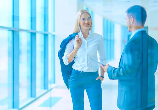 Smiling successful business team standing in office — Stock Photo, Image