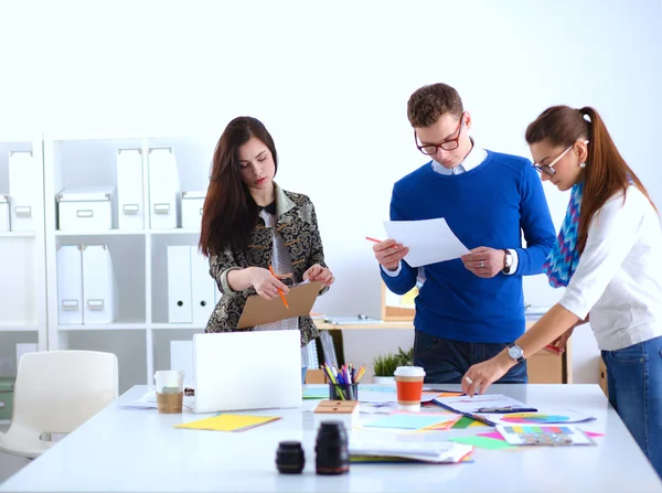 Young business people working at office on new project — Stock Photo, Image