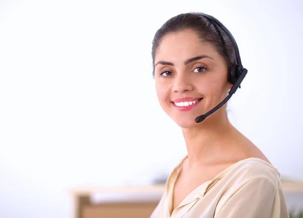 Close-up portrait of a customer service agent sitting at office — Stock Photo, Image