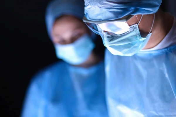 Team surgeon at work in operating room. — Stock Photo, Image