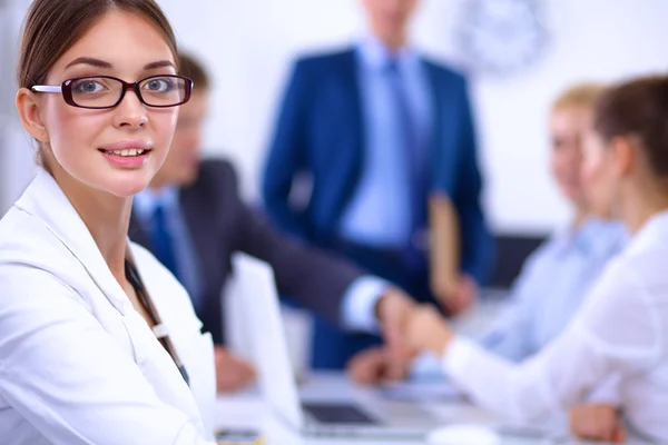 Business people shaking hands, finishing up a meeting, in office — Stock Photo, Image